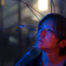 A woman is lost in thought wondering "why do I feel stuck?"